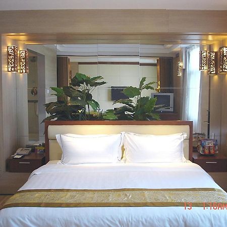 New Beacon Xinhang International Hotel Vuhan Oda fotoğraf