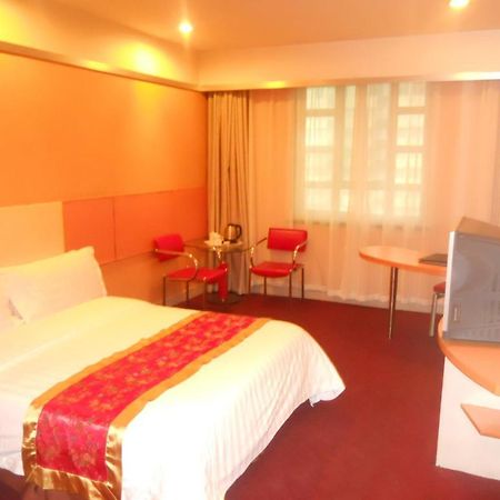 New Beacon Xinhang International Hotel Vuhan Oda fotoğraf