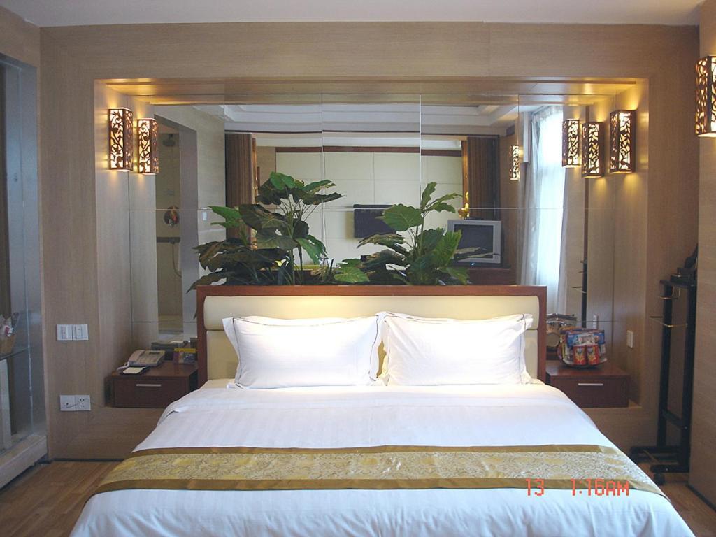 New Beacon Xinhang International Hotel Vuhan Oda fotoğraf