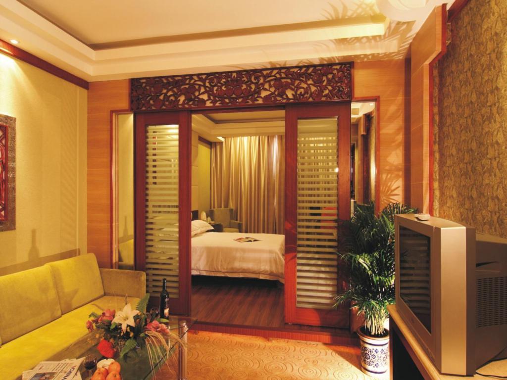 New Beacon Xinhang International Hotel Vuhan Oda fotoğraf
